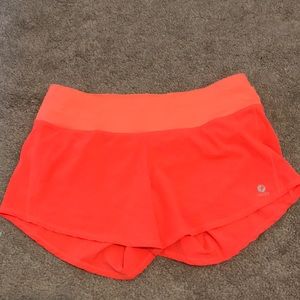 Oiselle roga shorts, size 4. neon orange